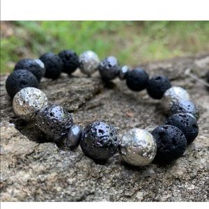 Men’s genuine lava and hematite bracelet.  One size
